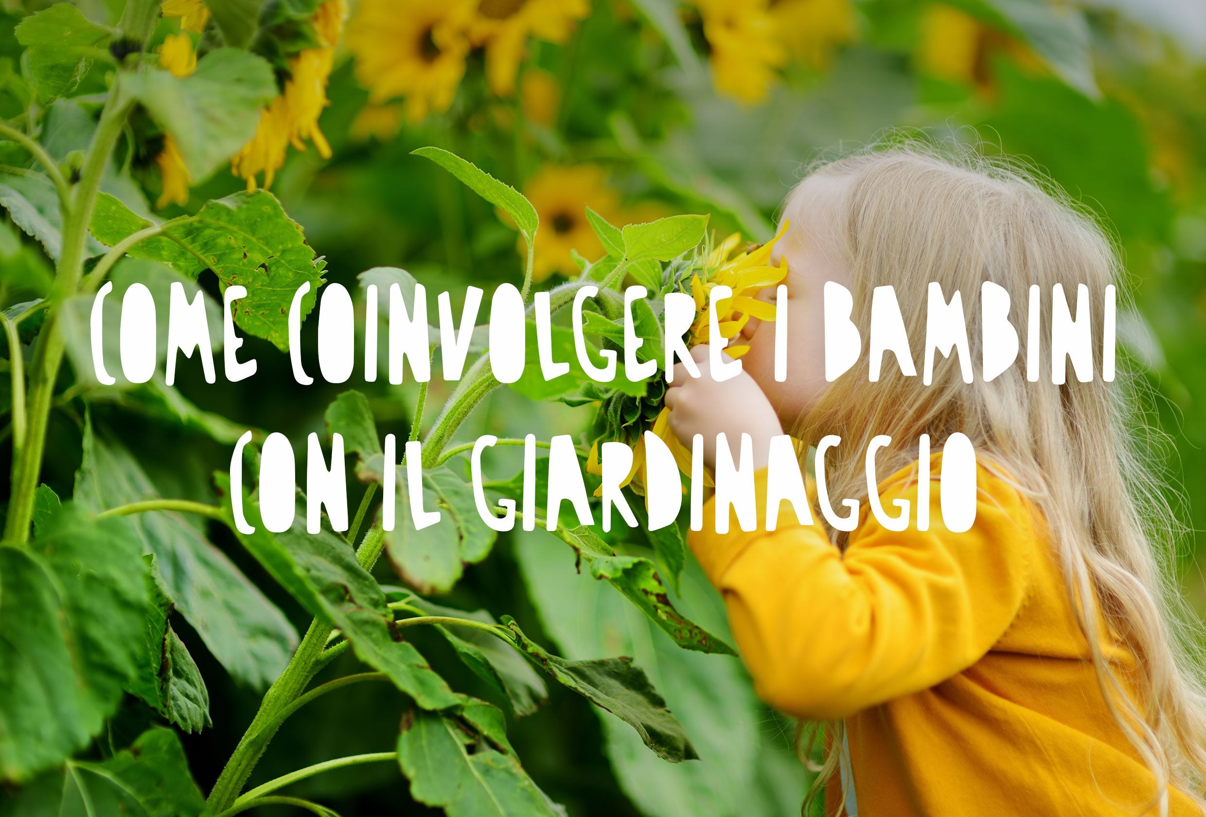 una bambina che gioca tra i girasoli